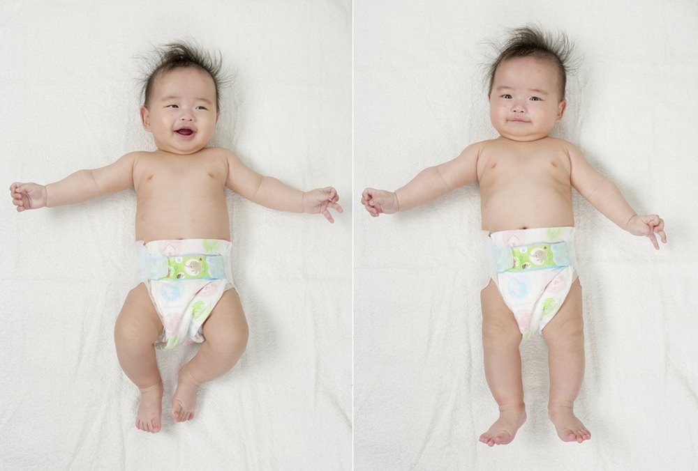 幫寶寶拍大頭照DIY，需要把寶寶放在白色浴巾上面，讓背景乾淨之後才好去背修圖